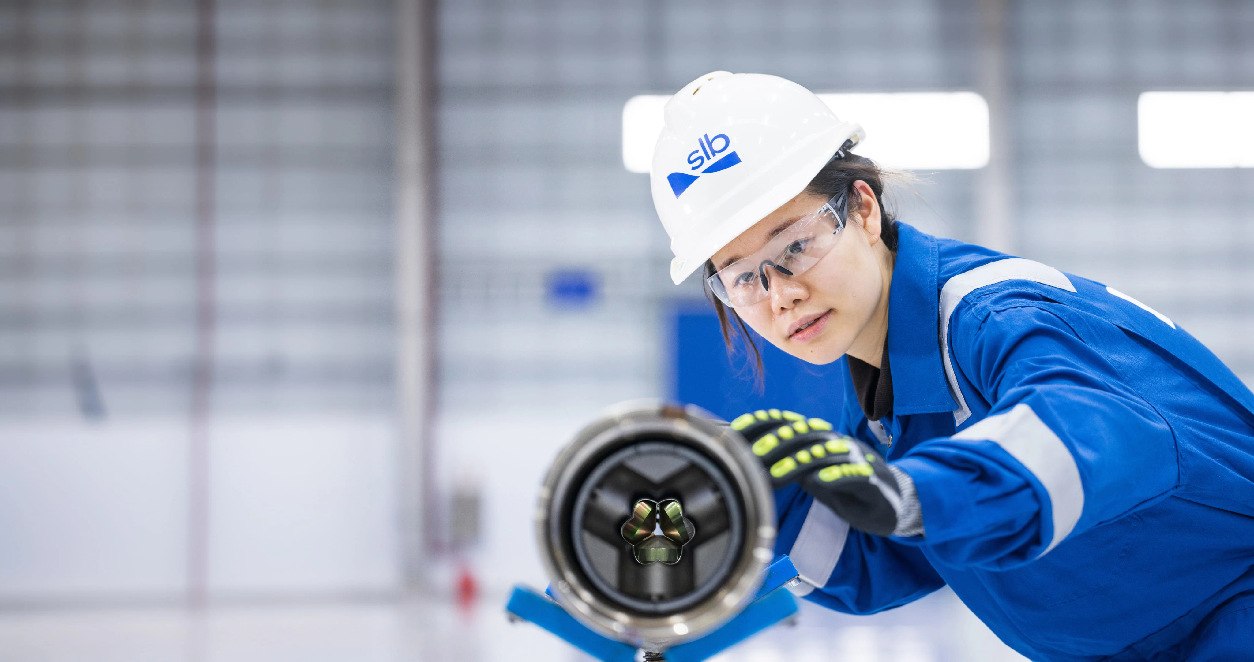Woman in front of a waterfall